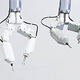 Illustration for article titled This Robotic Surgeon Climbs Inside Astronauts' Belly Buttons